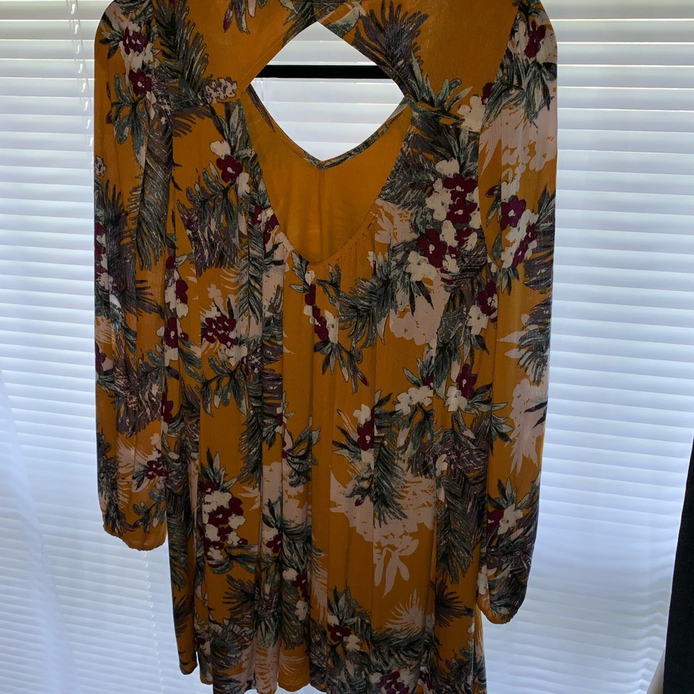 Long sleeve, open back dress